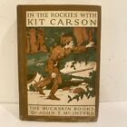 W Skalistych z Kit Carson autorstwa Johna T. McIntyre antyczny 1913 poplamiony