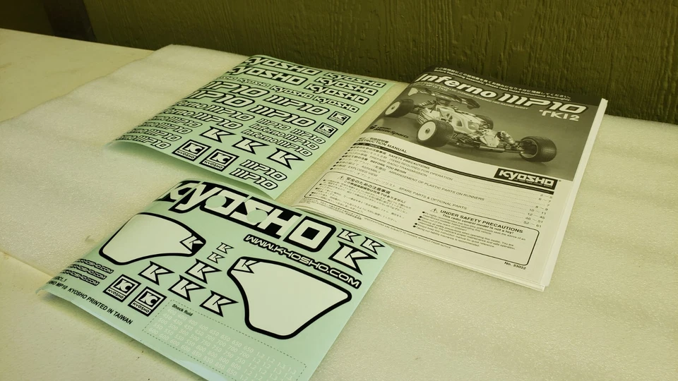 KYOSHO INFERNO MP10 TKI2  INSTRUCTIONS MANUAL AND STICKER SHEET  - Image 1 of 1