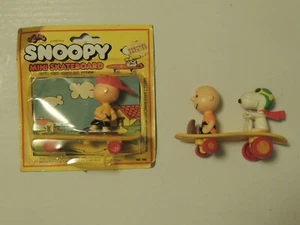 SNOOPY MINI SKATEBOARD 1971 N° 750 avec Charlie Brown - Snoopy & Charlie B - Photo 1/4