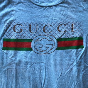 camisa gucci leao