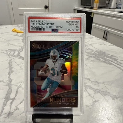 2023 SELECT RAHEEM MOSTERT TIE-DYE NUMBERS "31" PRIZM #04/25 DOLPHINS - Image 1 of 2