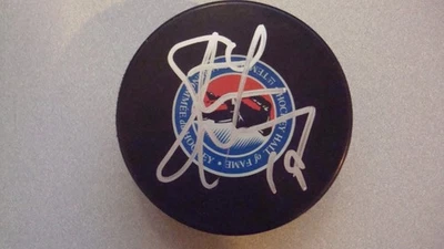 STEVE YZERMAN AUTOGRAPHED HALL OF FAME HOCKEY PUCK SIGNED DETROIT REDWINGS JSA - Image 1 of 2