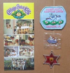 80s CABBAGE PATCH KIDS HOBBY CITY ADOPTION CENTER POSTCARD PINS PATCH ANAHEIM CA - Picture 1 of 9
