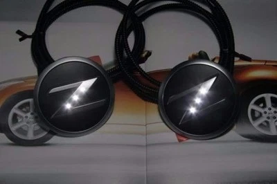 NISSAN Z33 350Z OEM FRONT SIDE FENDER CUSTOM EMBLEM W/ White LED Light Kit Pair - Изображение 1 из 4