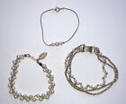 3 unbranded gold tone bracelets with faux pearls
