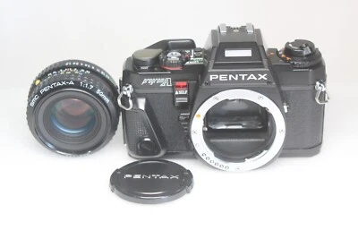 Excelente cámara de película Pentax Program A + lente SMC Pentax-A 50 mm F/1,... - Imagen 1 de 4