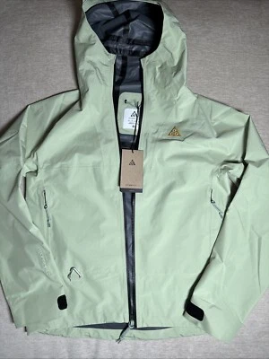 Chaqueta de lluvia para mujer Nike Storm-Fit ACG repelente en cascada, verde talla XS Foto 1 de 4