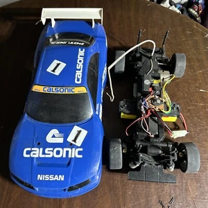 Tamiya TL01 Calsonic Nissan Skyline GT-R R33 4WD 1/10 RC Kit Auto - Foto 1 di 17