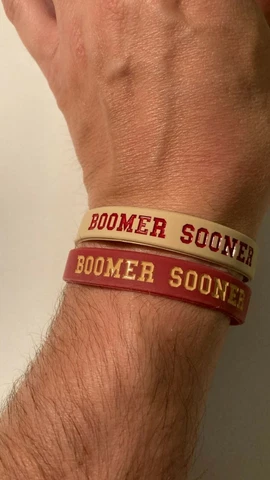 Oklahoma Sooners Wristbands Bracelets NCAA "BOOMER SOONER" Set Of 2 Cover