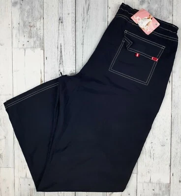 NUEVO CON ETIQUETAS Jockey Ropa deportiva para mujer Pantalones grandes Mezcla de nailon Cortavientos Ajustable  Foto 1 de 4