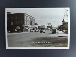Elko Nevada NV Idaho Street Real Photo Postcard RPPC Cars Signs c1940's - Picture 1 of 2