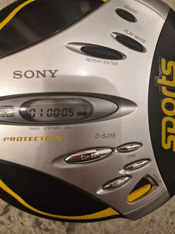 Sony Sports D-SJ15 con banda de mano CD portátil protección G negro probado funcionando Foto 1 de 4