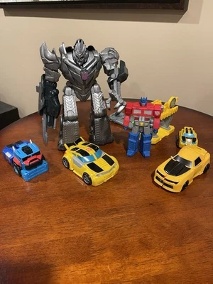 Lote De 7 Juguetes Transformers Megatron, Bumblebee Y Garaje, Optimus Prime Foto 1 de 4