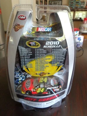 JEFF GORDON # 24 DUPONT 2010 SCHEDULE HOOD MAGNET CHEVY IMPALA 1/64 - Image 1 of 4