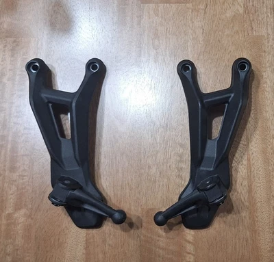 Benelli TNT 135 OEM Rear Passenger Left & Right Foot Pegs and Brackets - Image 1 of 4