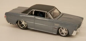 Pontiac GTO 1965 gris oscuro 65 G.T.O. Diecast escala 1/64 - Imagen 1 de 2
