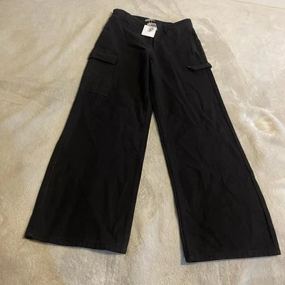 Pantalones Adika Mujer Grandes Negros Tiro Alto Carga Pierna Ancha Sueltos Patín Nuevos Foto 1 de 4