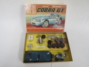 NUOVO K&B SHELBY COBRA GT SLOT CAR RACING KIT SCALA 1:25 CHALLENGER SIDEWINDER NUOVO CON SCATOLA - Foto 1 di 17