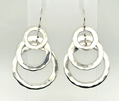 Pendientes colgantes circulares de plata de ley martillados Robert Lee Morris RLM Studio Foto 1 de 4