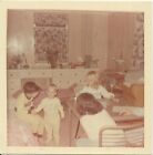 vintage color photo spooky out of frame hand girls at desk boys in pajamas