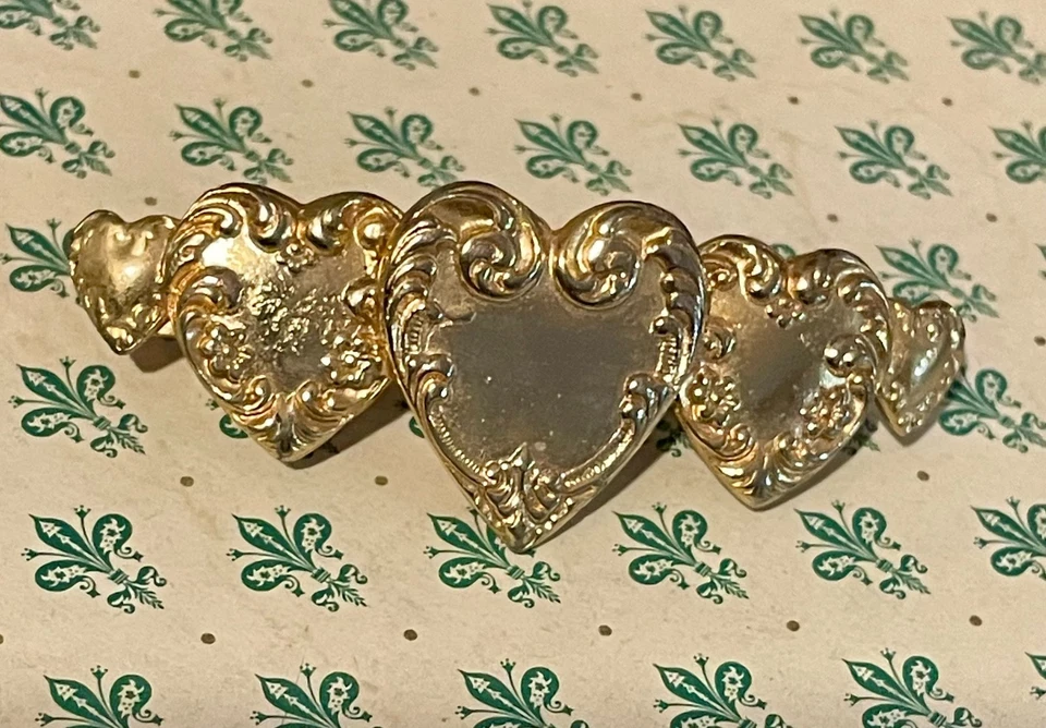 Pinza de pelo vintage KIRKS FOLLY rara 3 corazones FRANCIA tono dorado  Foto 1 de 4