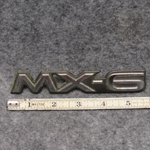 1993-1997 Mazda MX-6 Plastic Chrome Finish Emblem Broken Stud OEM 50412 - Foto 1 di 4