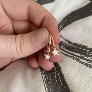 Gold Huggie Hoop Earrings with Small White Star Charm - Picture 1 of 3