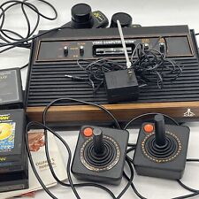 Atari 2600 Woodgrain 4 Switch System Paddles Joysticks 10 Games Manual Tested