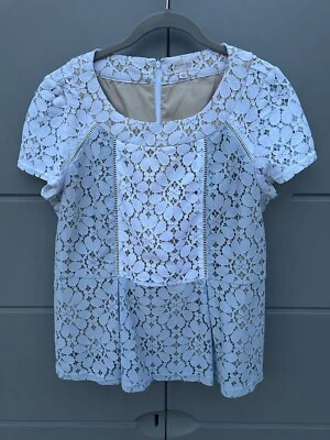 Nanette Lepore Baby Blue Pleated Peplum Lace Eyelet Overlay Top Blouse Sz Large - Image 1 of 4