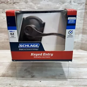 Manija de puerta de palanca de entrada con llave Schlage Accent bronce envejecido F51VACC716 (OB) - Imagen 1 de 7