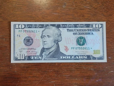 2017 Uncirculated $10 Star Note.  W/  Bleed Through Error On Serial #.  Debossed - Image 1 of 4