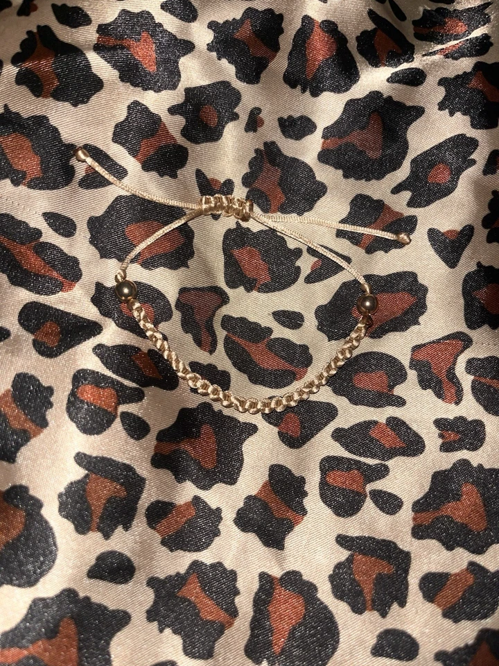 Pulsera marrón claro con cuentas de oro rosa Foto 1 de 1