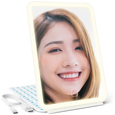 Espejo de tocador plegable compacto recargable con iluminación LED para viajes Foto 1 de 4