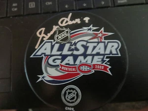 RARE DETROIT RED WINGS GORDIE HOWE SIGNED MONTREAL ALL STAR PUCK W/PROOF - Picture 1 of 3