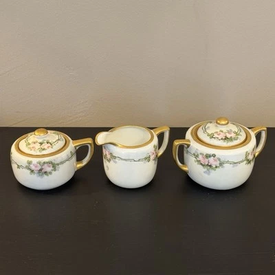 Antiguo juego de crema y azucarero Nippon pintado a mano - 5 piezas florales con tapas Foto 1 de 4