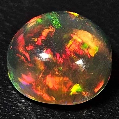 NATURAL AAA+ VVS AMAZING COLOR PLAY ROUND CABOCHAN ETHIOPIAN WELO OPAL 1.65 CTS - Image 1 of 3