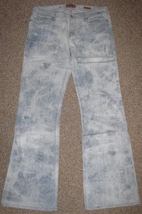 ¡NUEVO SIN ETIQUETAS! JEANS de diseñador SEVEN 7 descoloridos de mezclilla en dificultades elásticos acampanados raros 31 $168 - Imagen 1 de 1