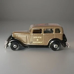 '33 Plymouth PC Berlina 55/125 Matchbox 2018 FHG77 (marrone) MBX Soccorso POLIZIA - Foto 1 di 9