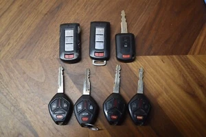 lot of 7 OEM mitsubishi lancer mirage smart keys remotes fob OUC644M-KEY-N - Picture 1 of 4