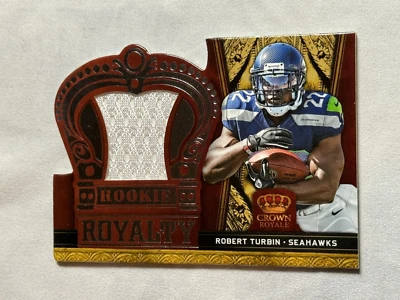 2012 Panini Crown Royale Rookie Royalty Materials Robert Turbin /149 #27 - Image 1 of 2