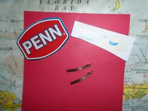 2 PENN INTERNATIONAL 50 FLAT DOG SPRINGS NEW PENN REEL PART 14-50 + 30 80 REELS - Picture 1 of 3