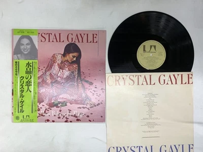 CRYSTAL GAYLE WE MUST BELIEVE IN MAGIC Japan LP [54225ER] - Image 1 of 2