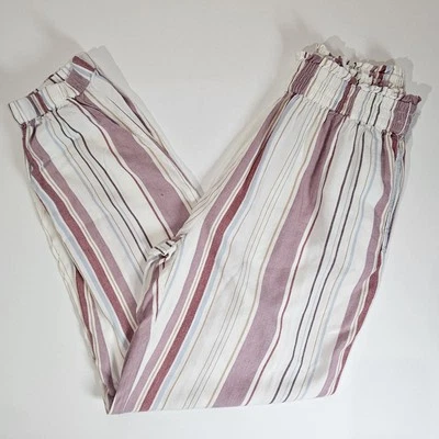 Pantalones American Eagle para mujer talla pequeña blancos multicolores a rayas tiro alto elásticos Foto 1 de 4