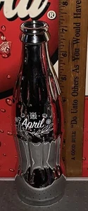 COCA - COLA BIRTHSTONE MONTH APRIL 8OZ AIR FILLED SILVER CHROME COKE BOTTLE - Picture 1 of 2