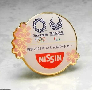INSIGNIA PRENDEDORES OLÍMPICOS 2020 TOKIO 2021 JAPÓN SOCIO MUNDIAL PATROCINADOR FLOR NISSIN - Imagen 1 de 1