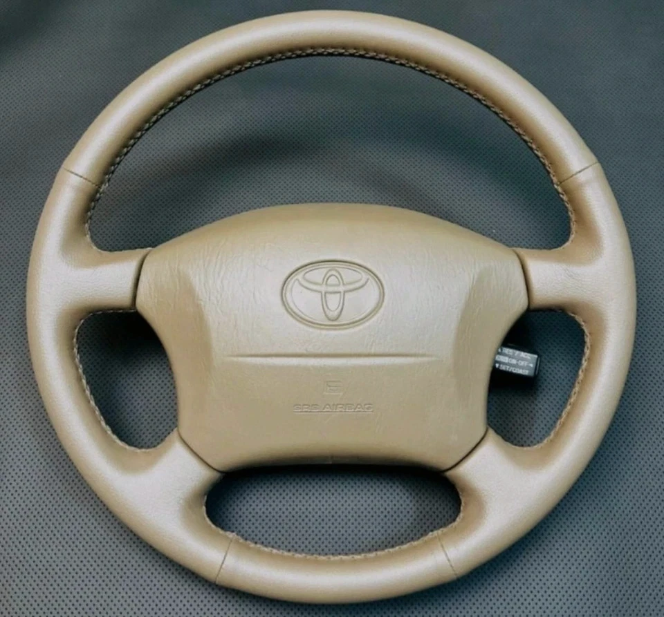 Toyota Land Cruiser 100 Series, Lexus LX470 Leather Stiched OEM Steering Wheel - Image 1 of 4