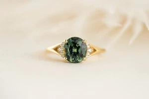 Anello di fidanzamento argento sterling 925 taglio ovale zaffiro Teal Montana placcato oro - Foto 1 di 4