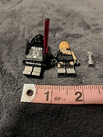 Darth Vader With suit and without suit LEGO Star Wars  Minifigures and saber.