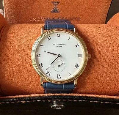 Relógio Patek Philippe Calatrava ouro amarelo 18k mostrador branco - 3919J - Imagem 1 de 4