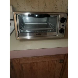 Bella 4 Slice Stainless Steel and Black Toaster Oven model MG10CDL And It Works - Picture 1 of 3